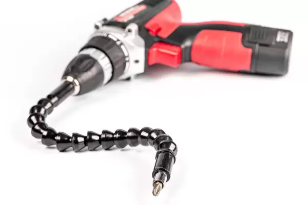 Screwdriver with a flexible universal extension