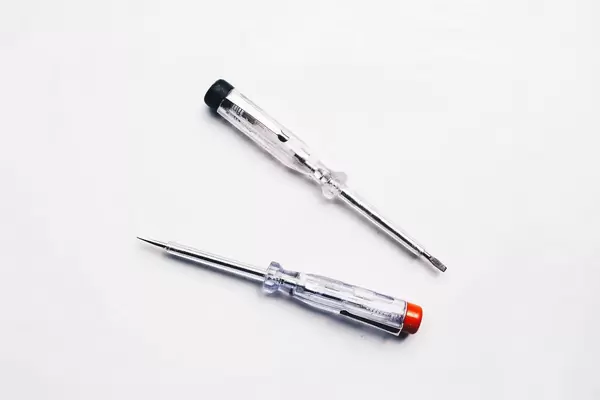 Screwdrivers on white background. Top view