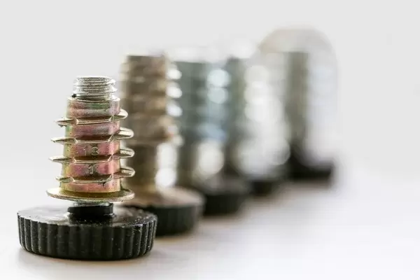 Screws with a clutch on a white background