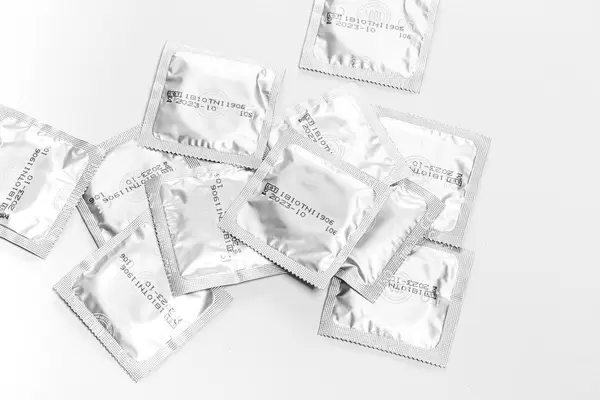 Sealed condoms. Contraception concept