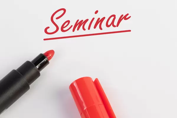Seminar text with red marker pen