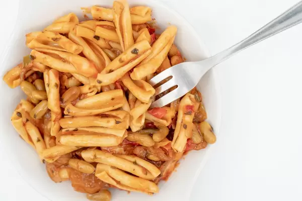 Served Pasta with Tuna on the white plate (Flip 2020)