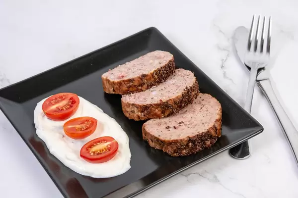 Served Pork and Chicken Meat Loaf with Tomatoes (Flip 2019)