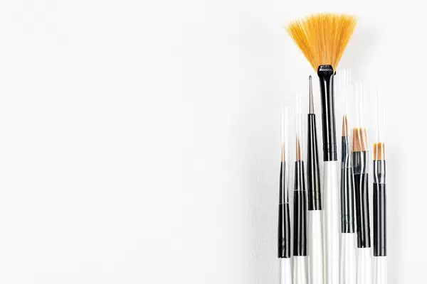 Set of a cosmetic brushes on a white background