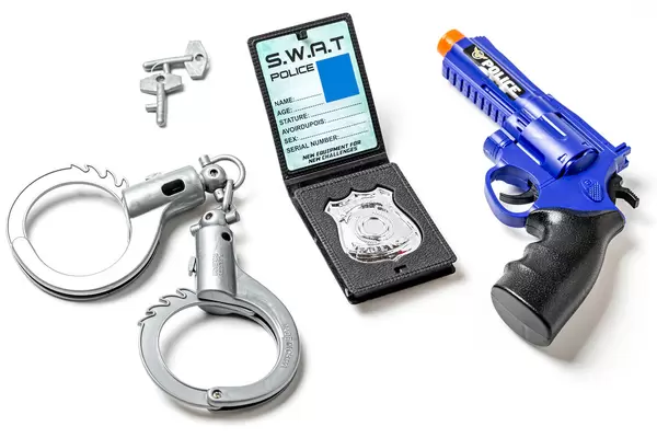 Set of children's toys on white, police game concept