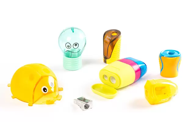Set of different children's sharpeners on a white background