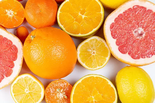 Set of different citrus fruits on a white background, top view (Flip 2020)