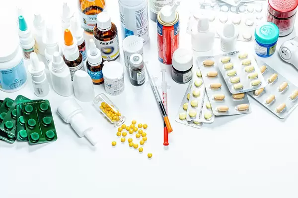 Set of different Drugs, pills, drugs and syringes on a white background