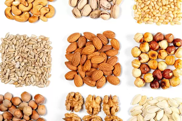 Set-of-nuts-and-seeds-on-white-concept-of-natural-healthy-nutrition.jpg