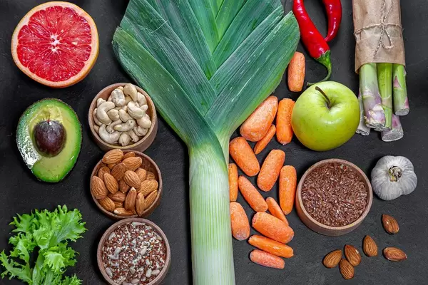 Set of products for healthy food on black background. Top view