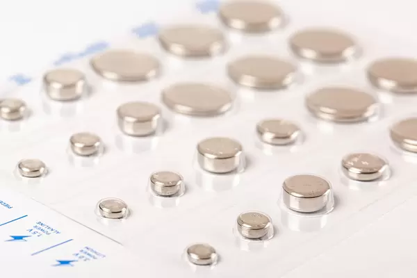 Set of round batteries of different sizes in a package