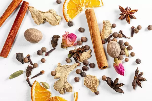 Set of spices for mulled wine on a white background