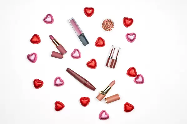 Set of various lipstick collections with sweet candies
