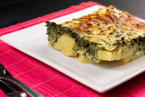 Seved Spinach Pie with Potatoes on the plate