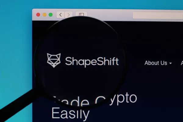 ShapeShift logo under magnifying glass