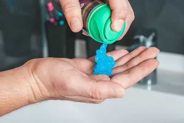 Shaving gel on a man's hand. Care concept (Flip 2019)