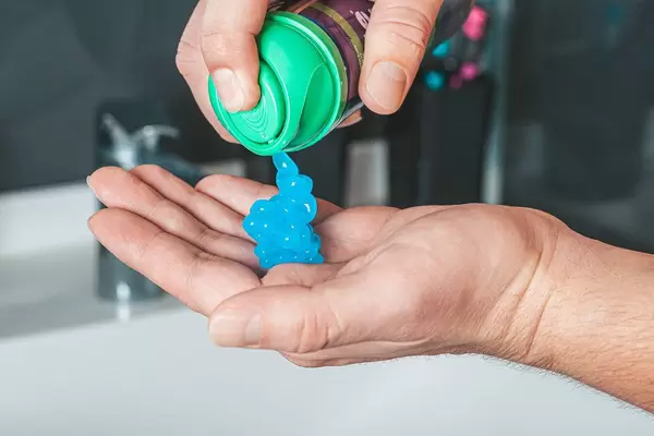 Shaving gel on a man's hand. Care concept