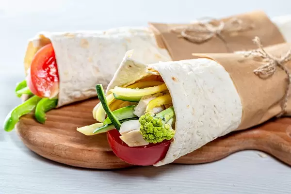 Shawarma on a wooden kitchen Board