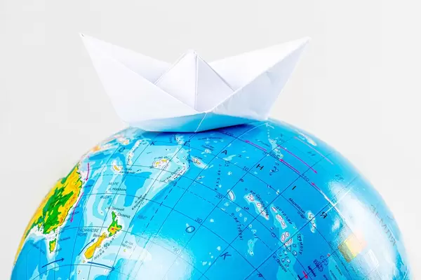 Ship from a paper on globe