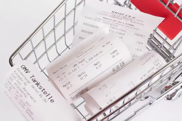 Shopping cart full of Receipts