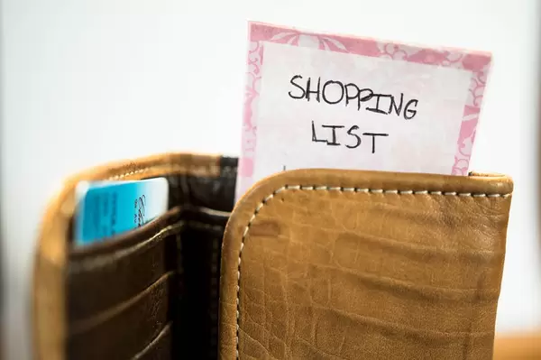Shopping list stuck in a wallet
