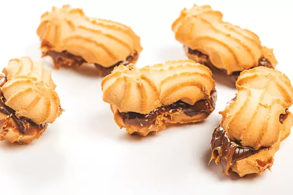 Shortbread cookies with condensed milk on white