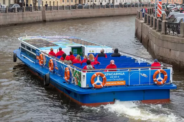 Sightseeing boat on the Moyka River in Saint Petersburg