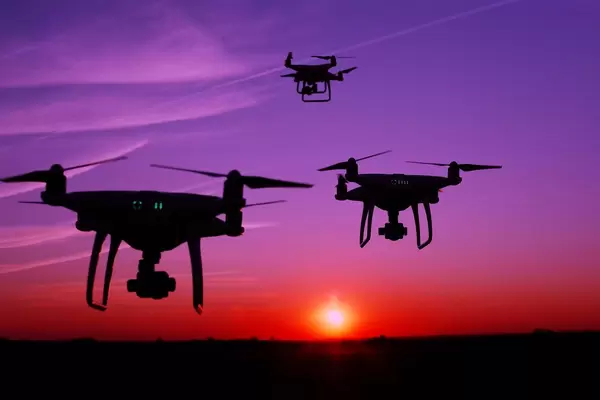 Silhouette of drones in the sky (Flip 2019)