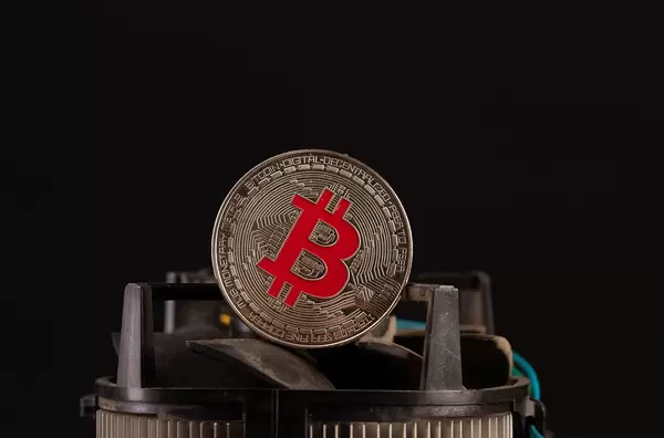 Silver Bitcoin on computer parts