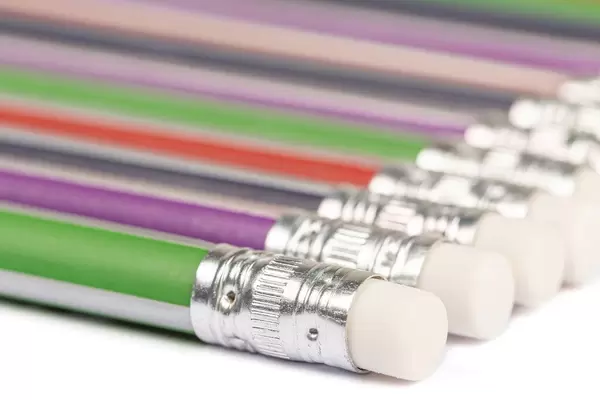 Simple pencils with erasers on a white background