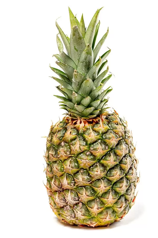 Single whole pineapple on white background (Flip 2019)