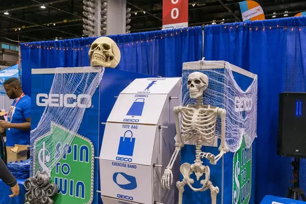 Skeleton and skull at a spin to win game by at North Building of the McCormick Place Convention Center
