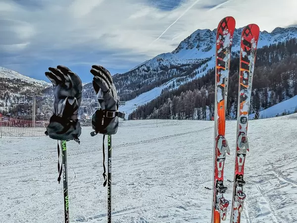 Ski equipment in high mountains in snow at winter
