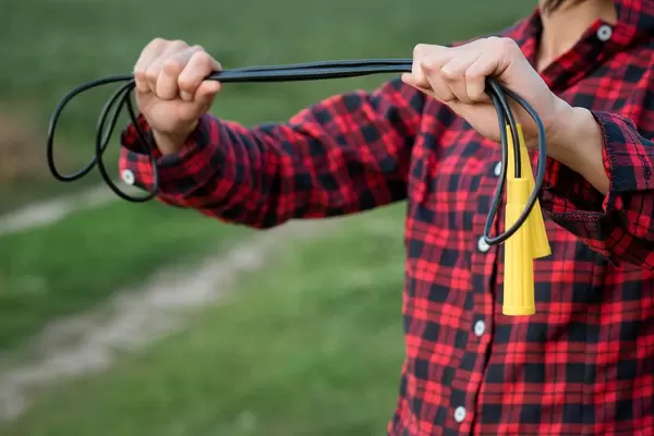 Skipping rope in women's hands. Concept it's time to train