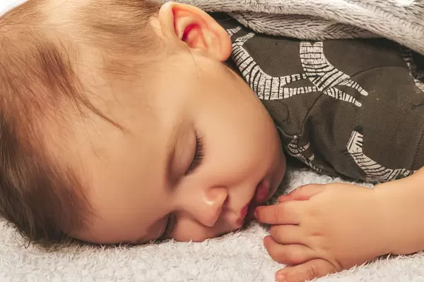 Sleeping little boy, close up
