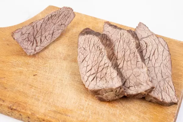 Sliced Boiled Beef on the wooden cutting board