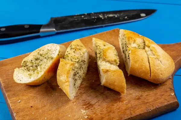 Sliced Bread Bruschetta on the wooden board (Flip 2019)