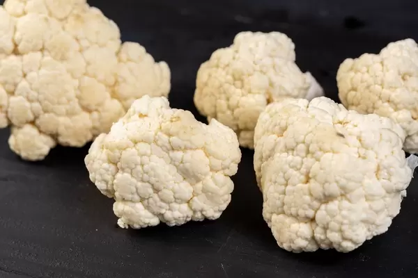 Sliced Cauliflower on the black table (Flip 2019)