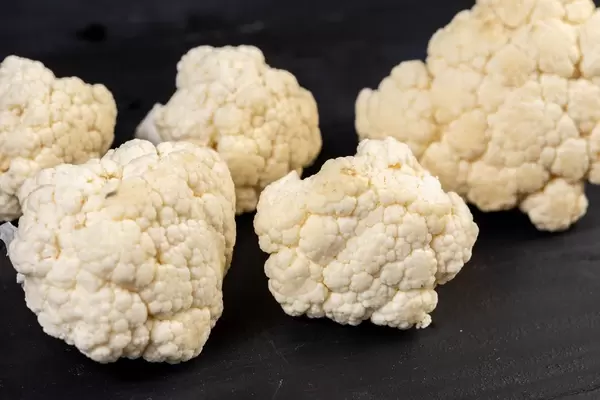 Sliced Cauliflower on the black table