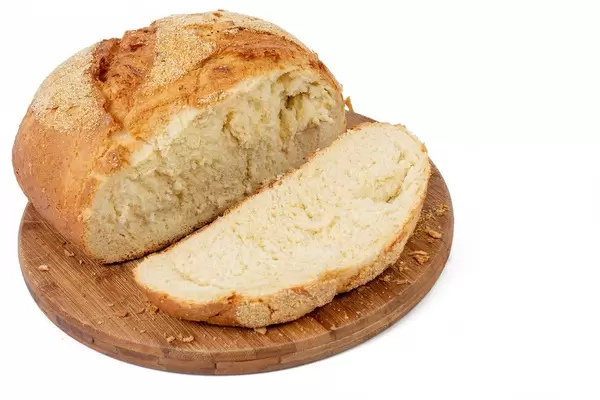 Sliced Corn Bread above white background (Flip 2019)