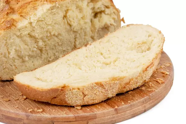 Sliced Fresh Corn Bread on the wooden board (Flip 2019)