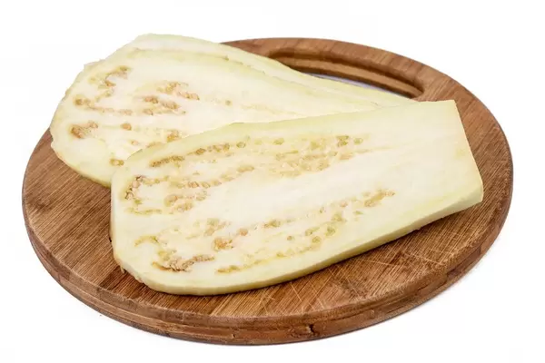 Sliced Fresh Eggplant on the wooden board (Flip 2019)