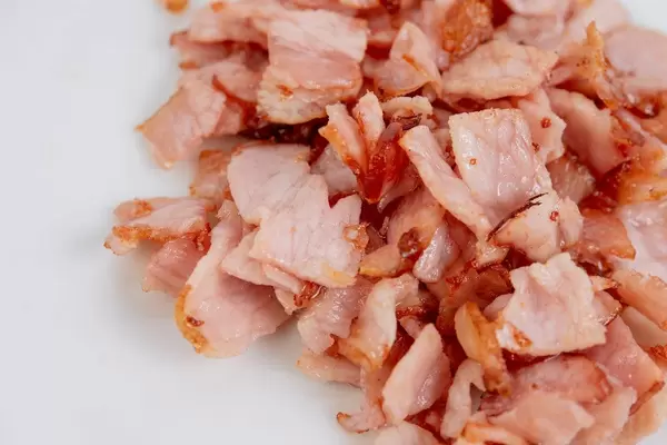 Sliced fried Ham served on the plate