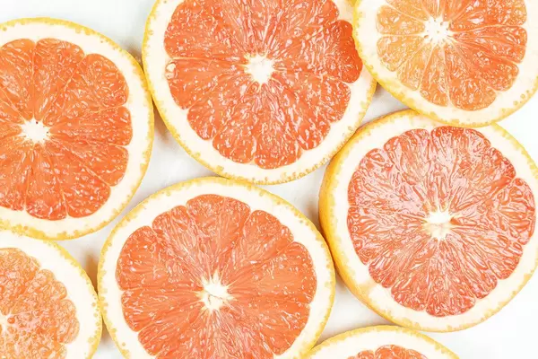 Sliced Grapefruit arranged on the table