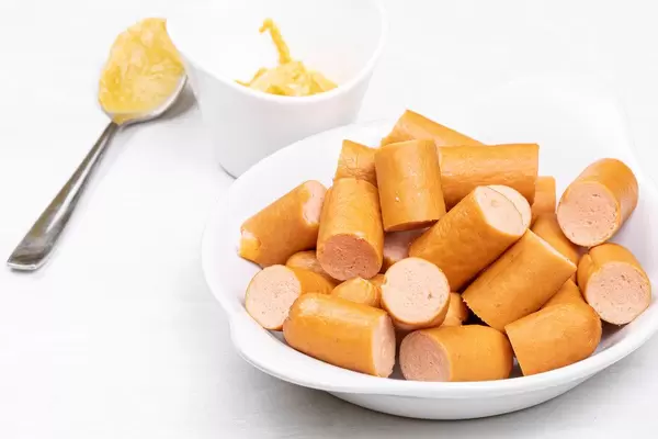 Sliced Hot Dog Sausages served on the plate