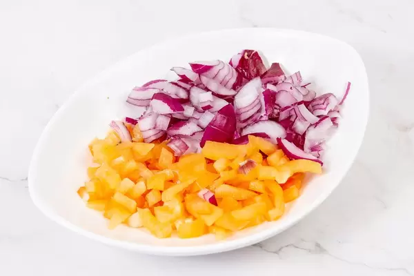 Sliced Onions and Yellow Paprika in the bowl (Flip 2019)