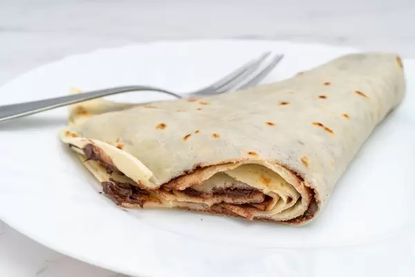 Sliced Pancake with Chocolate on the plate