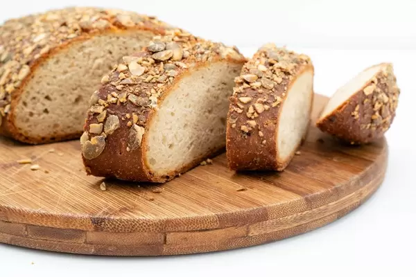 Sliced Protein Bread with Pumpkin seed on the wooden board (Flip 2019)