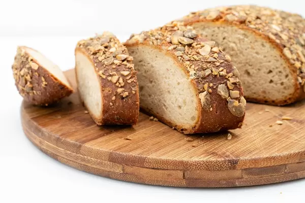 Sliced Protein Bread with Pumpkin seed on the wooden board