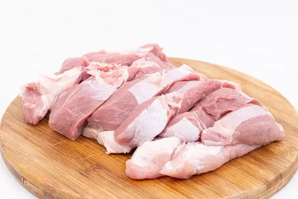 Sliced Raw Pork Meat on the wooden board